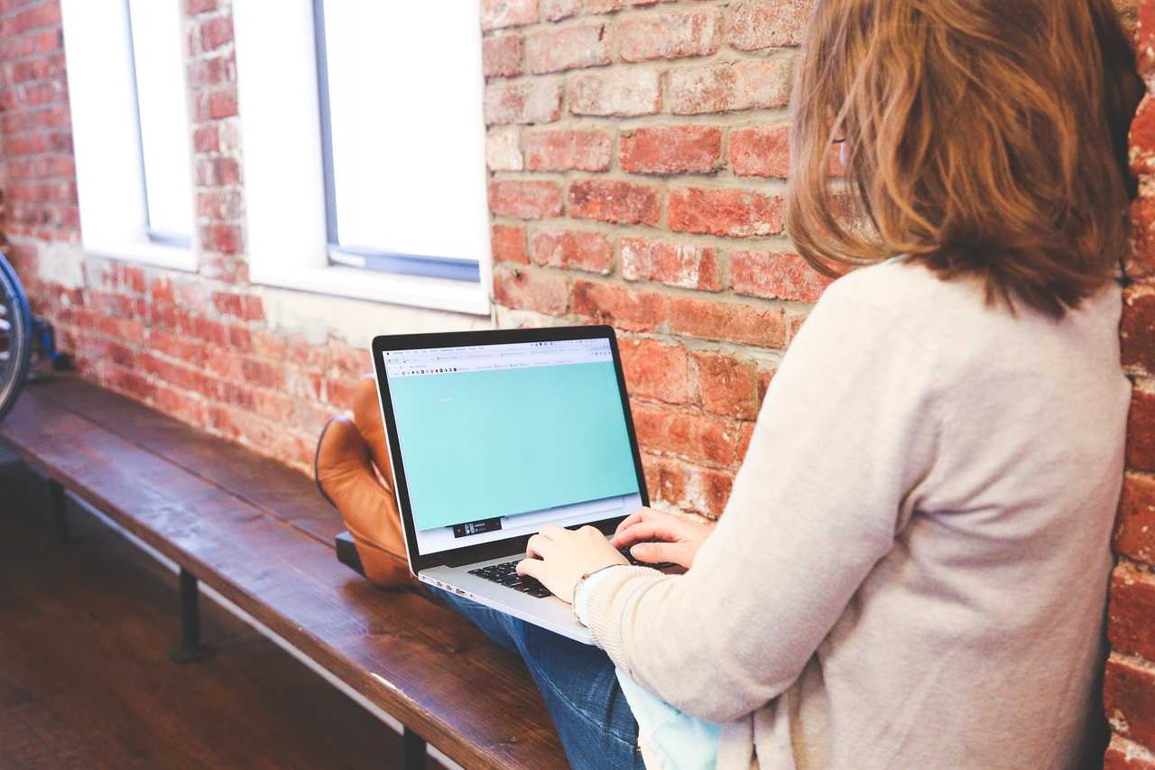 Women working on her laptop